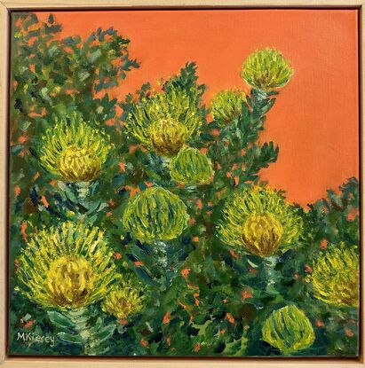 Yellow proteas against an orange background.