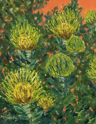 Yellow proteas against an orange background.