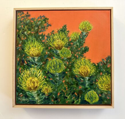 Yellow proteas against an orange background.