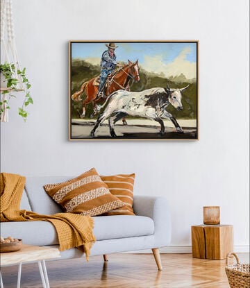 A brown chestnut horse with white blaze, saddle and western  rider. The cowboy is chasing down the black and white steer. The rider is wearing blue jeans with a blue shirt. Painted on a dark green background. 