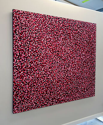 thousands of pink dots on black canvas