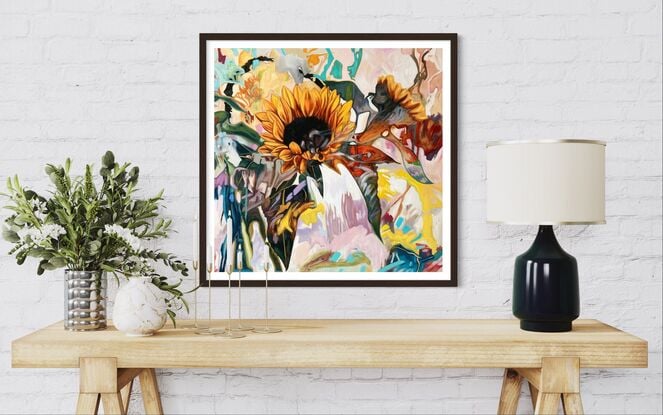 Picture of a sunflower painted in an abstract expressionistic style. The flower is surrounded by leaves that blend into abstract shapes and patterns. The image is warm and fluid with neutral earthy tones combined with yellows and pinks.