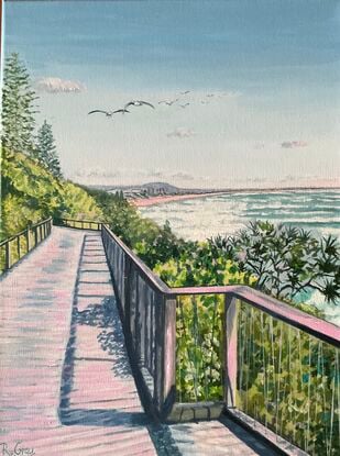 Beach boardwalk along the coast, framed by pandanus and coastal shrubs, seagulls overhead and views in distance,