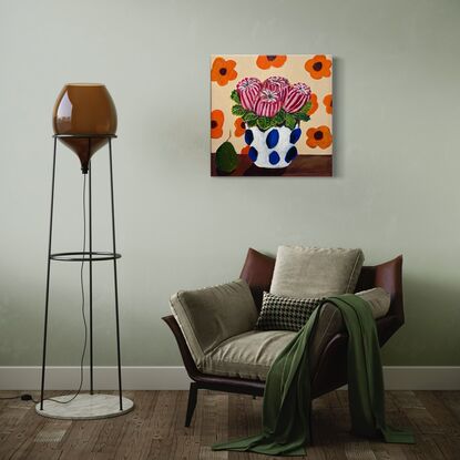 Banksia in the vase and a pear on table