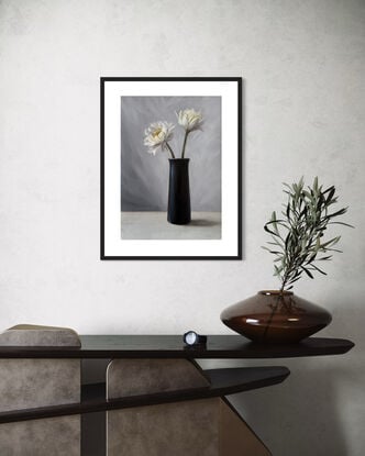 Still life with white flowers and black vase