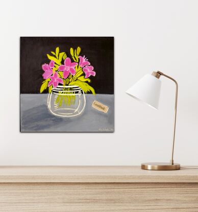 Purple flowers in a glass vase with green leaves on a background of dark paynes grey and light paynes grey. The word Gratitude is collaged onto the right side of the painting