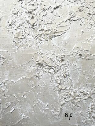 A neutral beige background with the bottom 3/4 covered with semi-transparent textured sea foam.