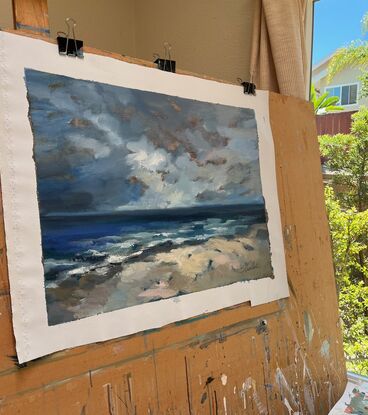 Dramatic seascape featuring sky, sea and sand before a storm