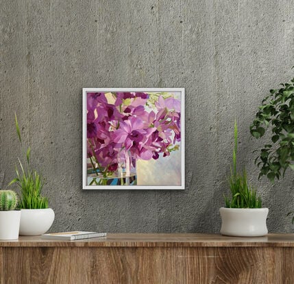 Purple Singapore Orchids in glass vase with reflections