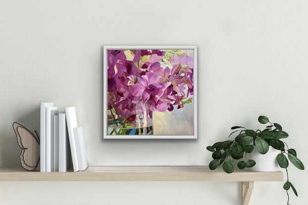 Purple Singapore Orchids in glass vase with reflections