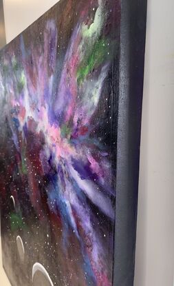 The painting "Celestial Symphony" captures the ethereal beauty of a cosmic aurora, set against a backdrop of swirling black and purple hues. The radiant stars twinkle like diamonds in the night sky, casting a mesmerizing glow that twinkles with liquid flow acrylic highlights. The clustered stars seem to dance in harmony, creating a sense of movement and energy within the celestial scene. This painting invites the viewer to gaze upon the vast expanse of the universe, feeling a deep connection to the mysterious wonders of the cosmos.
Colours used are fluorescent pink and green blue violet purple , clustered white, black and purple blue back ground all edges painted black .
Comes with a certificate of Authenticity 
