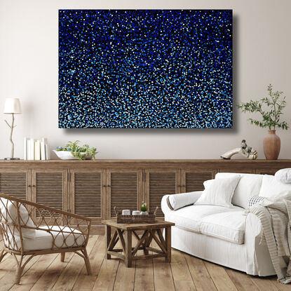 thousands of blue dots on black canvas