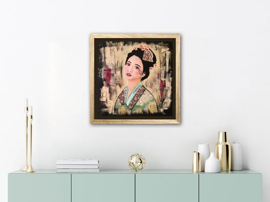 Japanese woman with flowers and ornaments in hair.