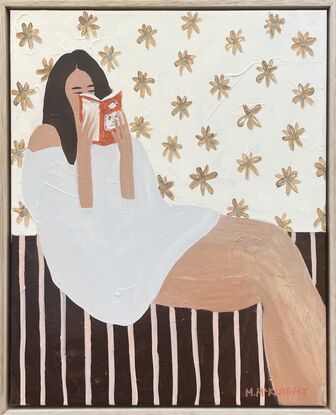 Gold background, woman reading book