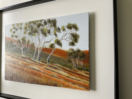 Australian Outback hill landscape dirt road and gumtrees 