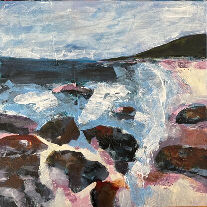 A coastal scene in pinks, purples, blues and greys, with rocks  in the foreground, a blue ocean, a dark headland and calm sky above. 