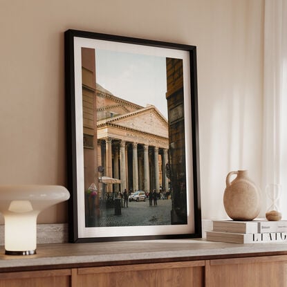 The Ancient Pantheon through a grungy street in Rome Italy