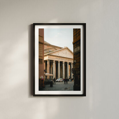 The Ancient Pantheon through a grungy street in Rome Italy