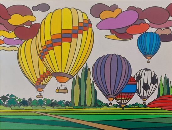 Hot air balloons embarking through the sky. 