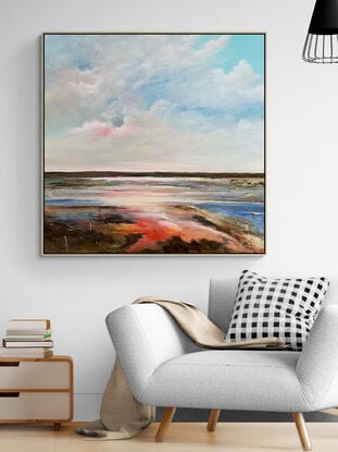 Colourful Textured abstract landscape with fluffy vibrant hot pink  white and blue fluffy clouds above a sunset filled landscape with blue water flowing through.