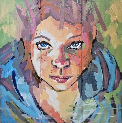 Brightly coloured face of young girl on 3 small canvases (triptych)