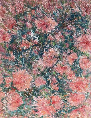 Pink and coral coloured flowers stand out predominantly over a blue and green background 