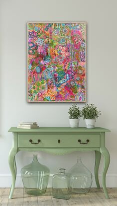 Pink, green, turquoise, and peach in organic shapes, patterns and marks.