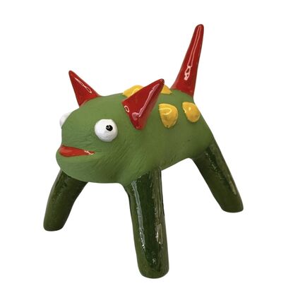 Here is a playful, fun sculpture with a chrome oxide green body, bright red ears, and deep yellow spots—an amiable fellow.