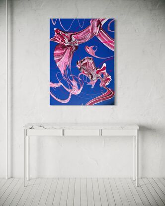 An abstract acrylic fluid art painting titled Blushing Whirlwind by Laura Anderson. The artwork features vibrant hues of pink, fuchsia, and crimson, swirling in dynamic patterns across a deep blue background. The texture is enhanced by an aerosol acrylic base, creating layers of movement and depth. The forms resemble wind currents or flowing ribbons, evoking a sense of fluidity and balance amidst the vibrant chaos.