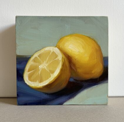 Original painting on wood. Two lemons on blue and green background. 