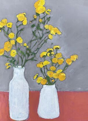 Yellow flowers in a white vase with orange table