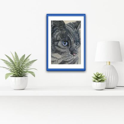 This is a portrait of a cat named Smudge - My name's Smudge. I think it's because I have a smudge 
of blue in my fur to match the blue of my eyes. I'm created in Watercolour  and, like 
most cats, have lots of fur and whiskers which takes lots of patience and layers to 
paint. Thanks to Lisa Heath for photo inspo and room displays by @insituartroom