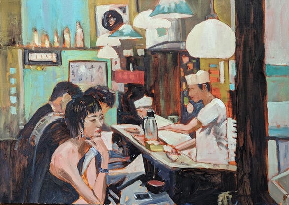 A small bar with patrons and staff.