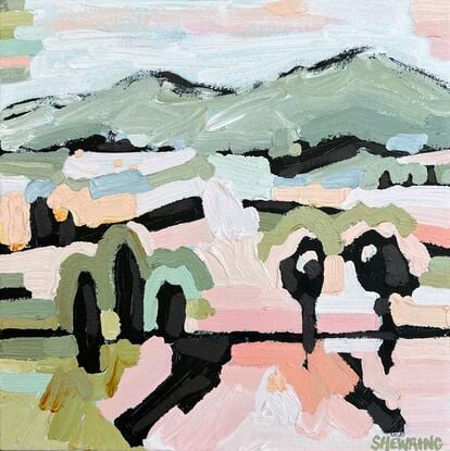 Mid sized framed canvas with a textured landscape scene in pastel tones of orange, pinks, blues and greens. Abstract hills, trees and foliage shapes chunky paint with visible big brushstrokes.