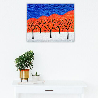 Textured black gum trees on an Australian Outback background. 