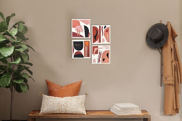 Red ochre , black and clay pink organic shapes collaged on a cream background and adhered to ply.