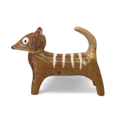 This stoneware sculpture features a stylised puppy.