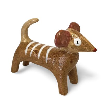 This stoneware sculpture features a stylised puppy.