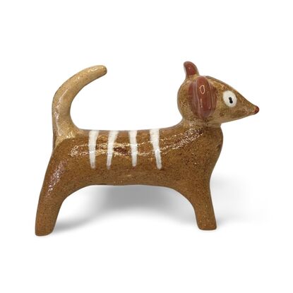 This stoneware sculpture features a stylised puppy.