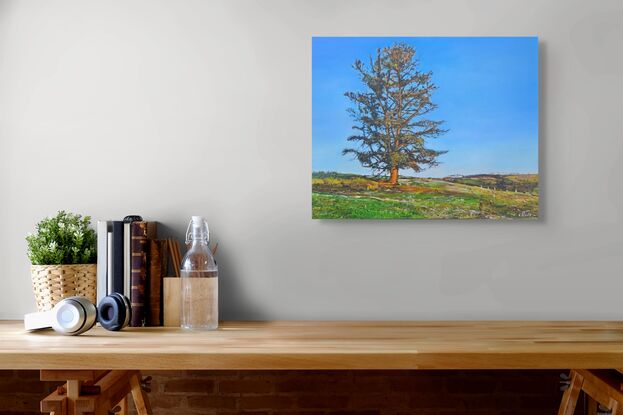 A landscape oil painting of a solitary tree with a park bench underneath. 