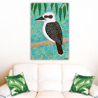 Kookaburra sitting in a tree textured abstract with blue sky and green leaves 