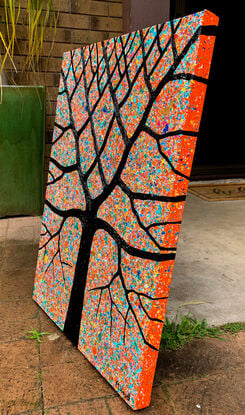 Textured black gum tree on an Australian Outback Sunset background. 