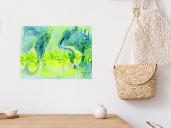 "Emerge" captures the vibrant interplay of greens and blues in this mixed media abstract artwork. The piece evokes a sense of renewal and growth, as fluid shapes and hues dance together in a symphony of color and form. This artwork invites viewers to explore the delicate balance between movement and stillness, offering a refreshing perspective that is both energizing and calming. Perfect for spaces that seek to inspire a connection to nature and the vitality of new beginnings.