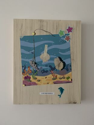 Shells and stickers in a ocean scene 