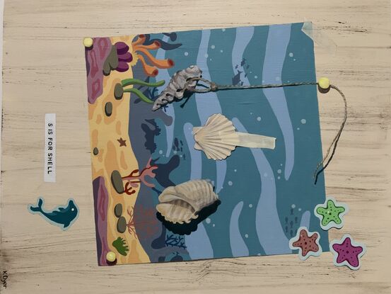 Shells and stickers in a ocean scene 