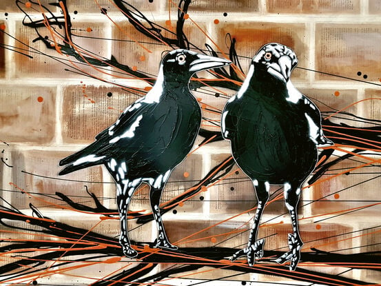 magpies sitting on a branch on brick wall