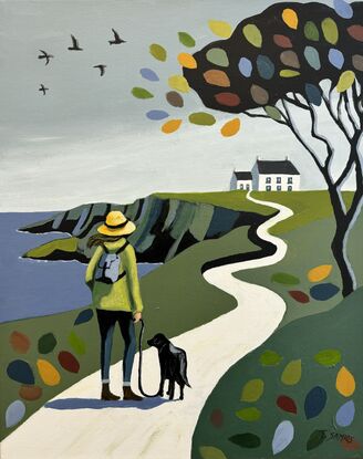 A lady wearing a green jacket, blue jeans and a yellow hat is walking her black dog along the coast along a winding white road or path that leads to a white Irish cottage. The lady had a brown long hair being blown to the side in the wind. The dog is on a leash. On the side of the white road there is green countryside with on the right a big black tree with branches with large coloured large oversized leaves. There are also some of these on the ground on each side of the path. The sky is overcast with some black birds flying. The coast has tall dark cliffs and the sea is a mud dark blue with white peaks of sea water where it meets the coastline. 