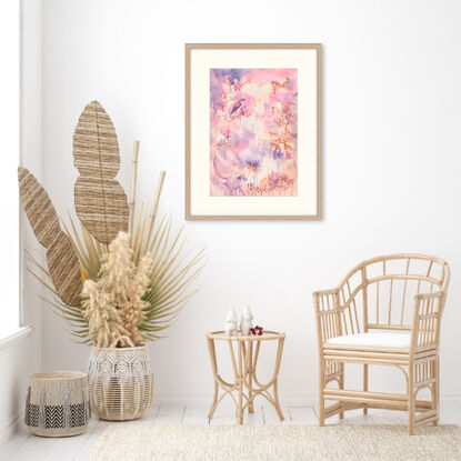 Abstract fantasy painting in hues of peach and pink with birds and flowers