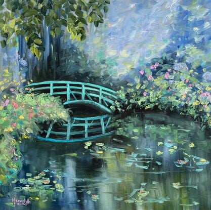 Monets green coloured garden bridge in Giverny, France.