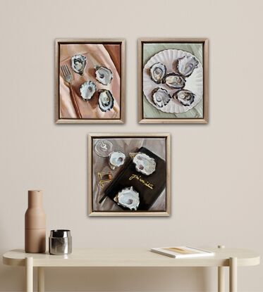 A still life table scape of oysters and wine